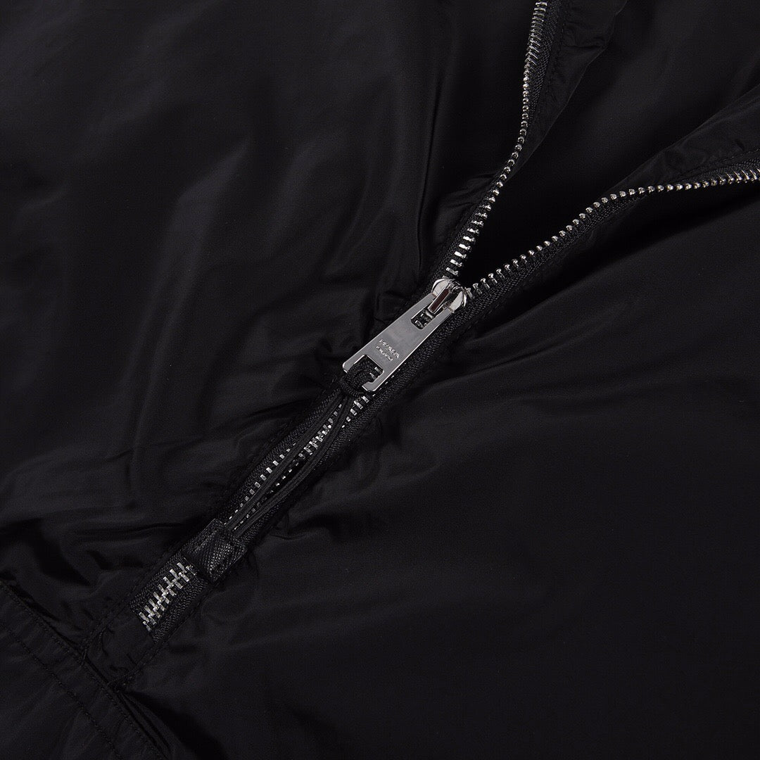 Nylon triangle logo half zip jacket <span class="brand-imgs PD"></span>