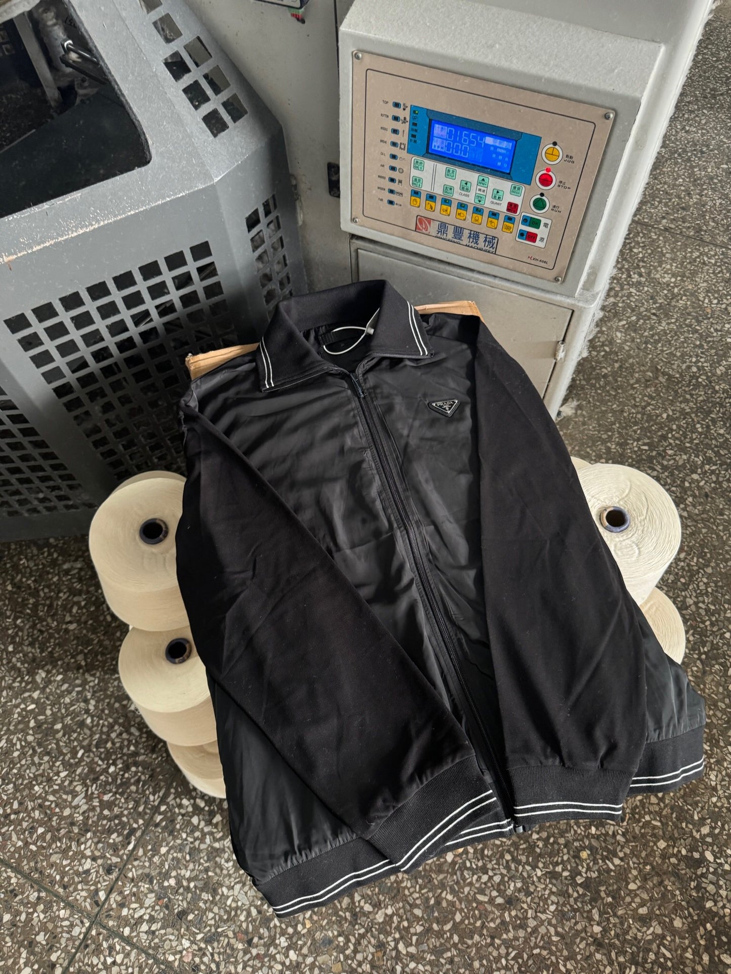 Nylon triangle logo jacket with patch work sleeves <span class="brand-imgs PD"></span>