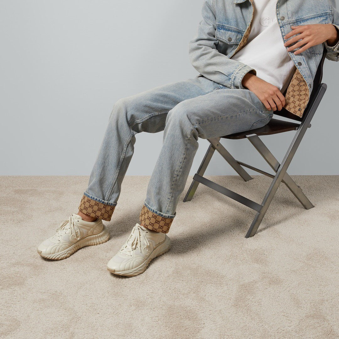 Jeans with floral pattern on hem blue<span class="brand-imgs GUCCI"></span>