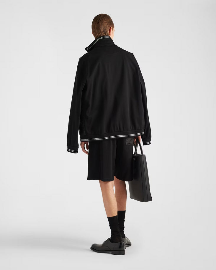 Nylon triangle logo jacket with patch work sleeves <span class="brand-imgs PD"></span>